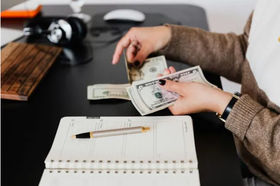person counting cash
