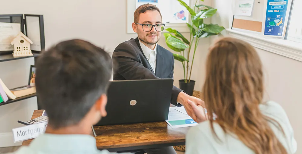 clients meeting with financial advisor