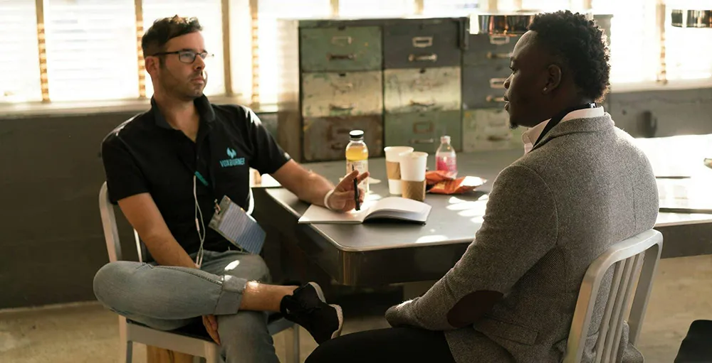 two men meeting in corporate office