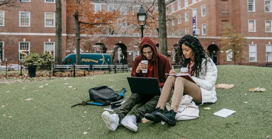 college students studying in park