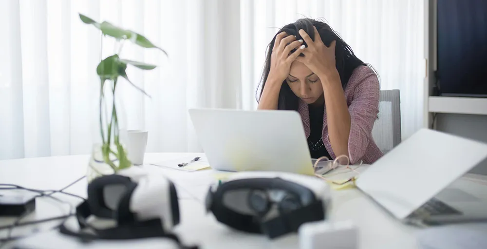 photo of stressed woman at work