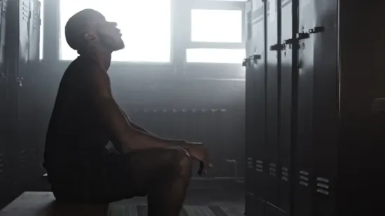 Student‑Athlete in locker room