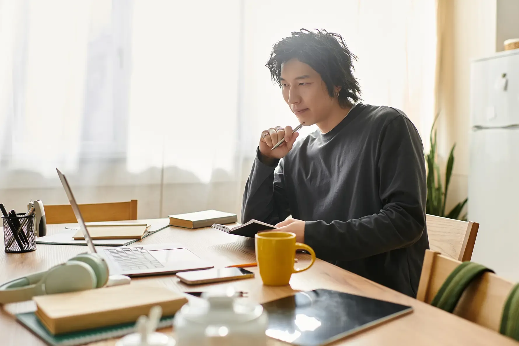 man working on computer at home