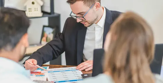 credit union employee discussing rates with members