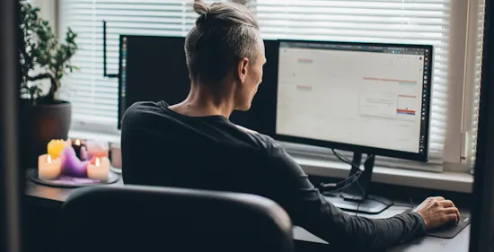 man working from home on computer