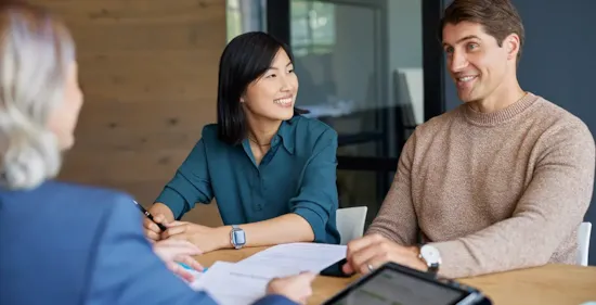 couple meeting with financial advisor